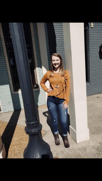 Mustard Ruffle top with jag jeans. 